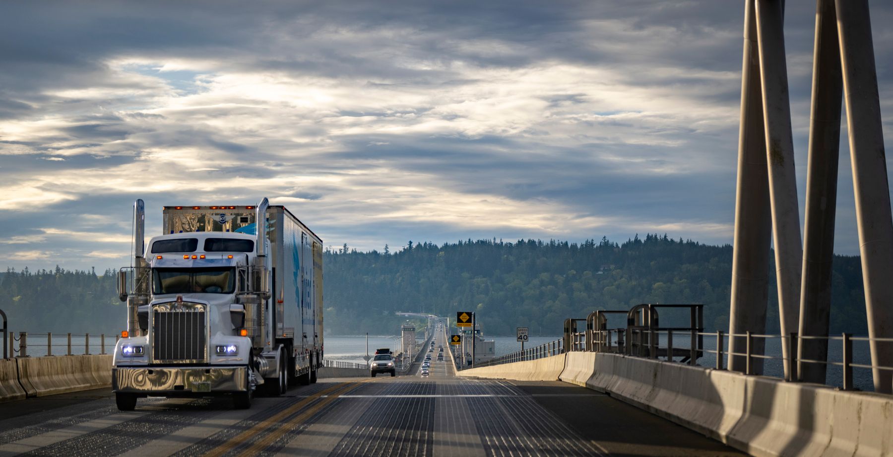 Long-haul truck on the highway at dusk